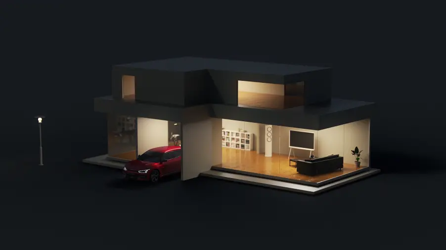 Nachtansicht Kia EV6 in Garageneinfahrt von beleutetem Haus